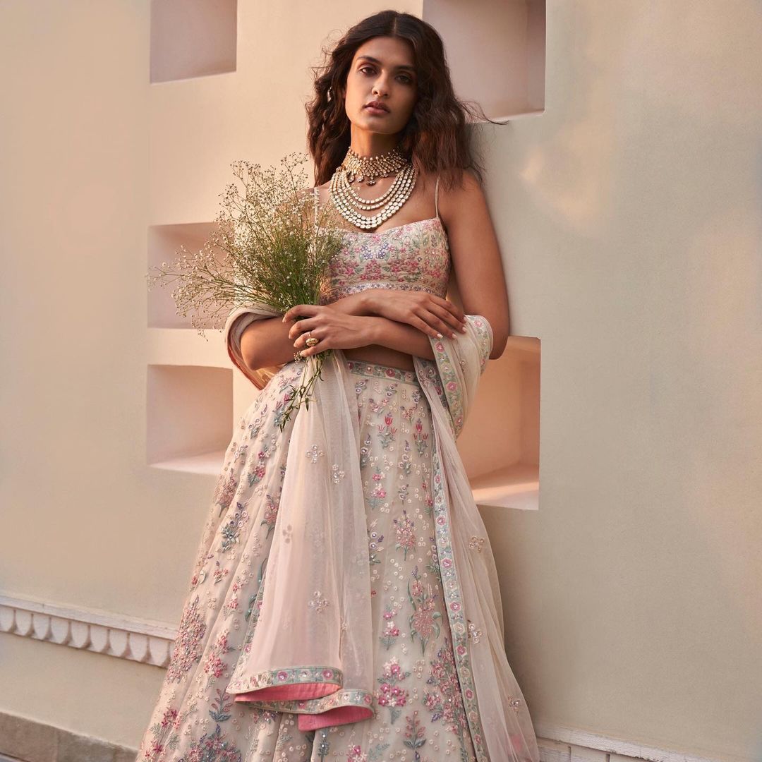 Ivory Multi color Embroidery Lehenga