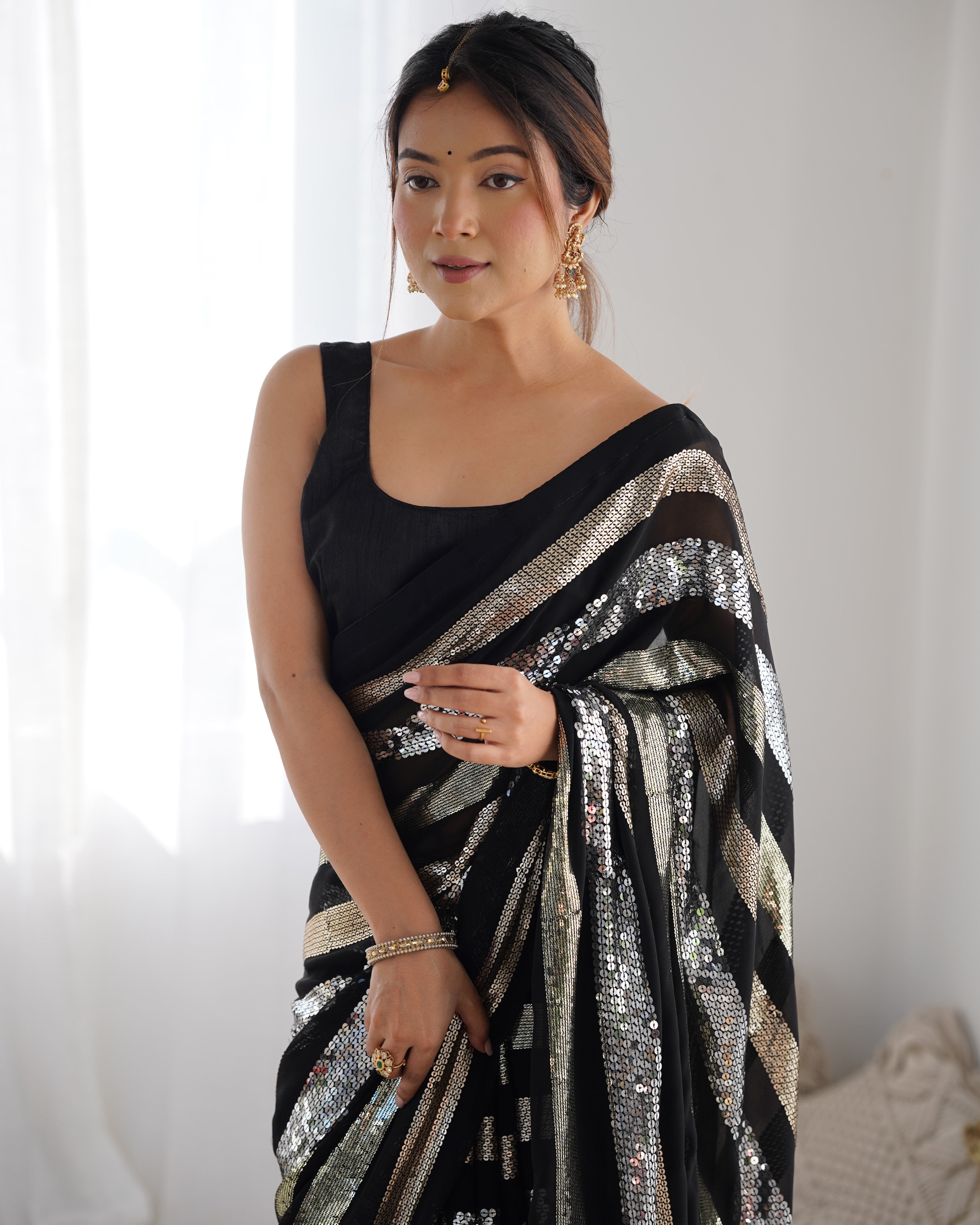 Solid Embroidered Striped Sequinned Saree For Women