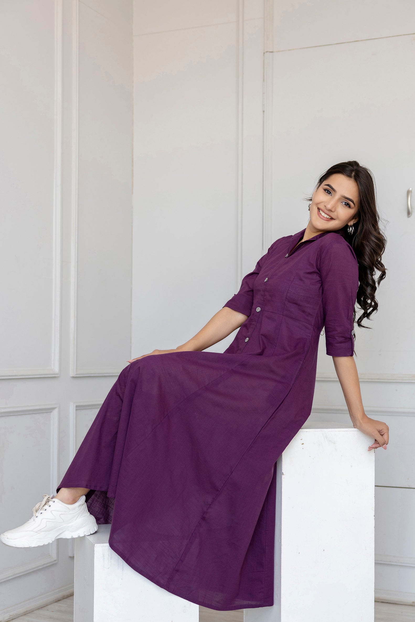 Women Purple Solid Flared Dress With Three Quarter Sleeves