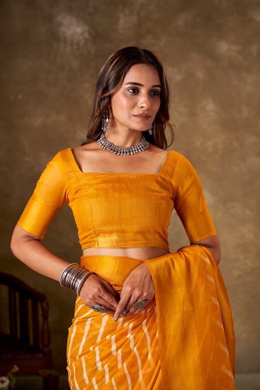Yellow Cotton Leheriya Saree and Stitched Yellow Blouse