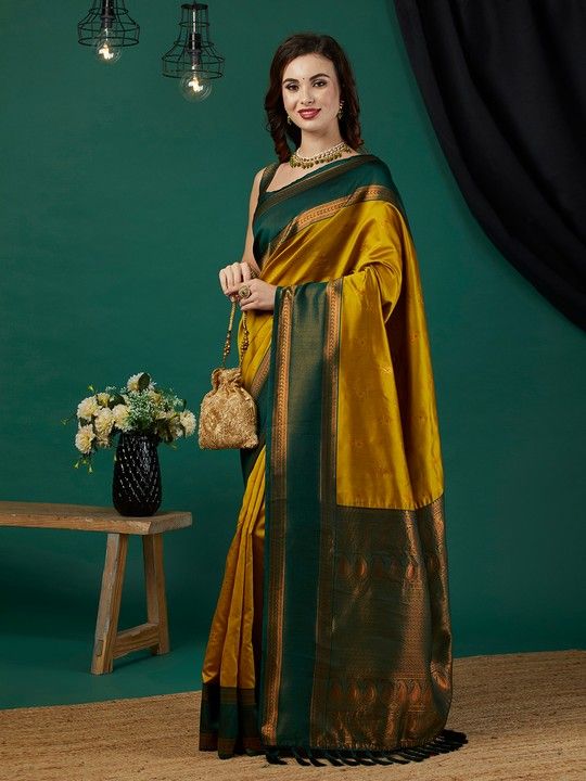 Mustard Banarasi Silk Woven Saree With Tassels on Pallu and Stitched Green Blouse