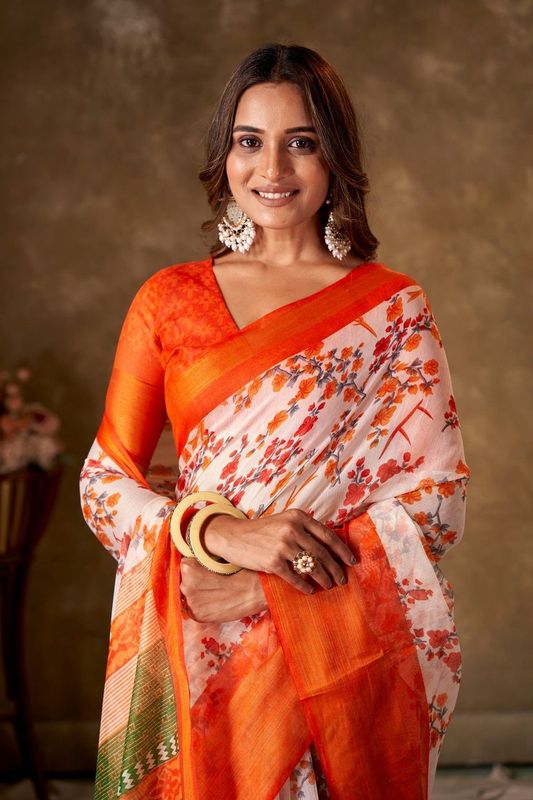 Orange Cotton Printed Saree and Stitched Orange Blouse