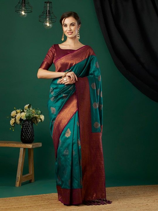 Aqua Banarasi Silk Woven Saree With Tassels on Pallu and Stitched Pink Blouse