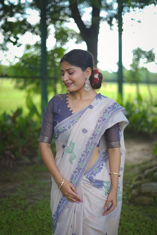 Rich Looks Floral Printed Off White Color Muga Cotton Saree For Sophisticated Looks