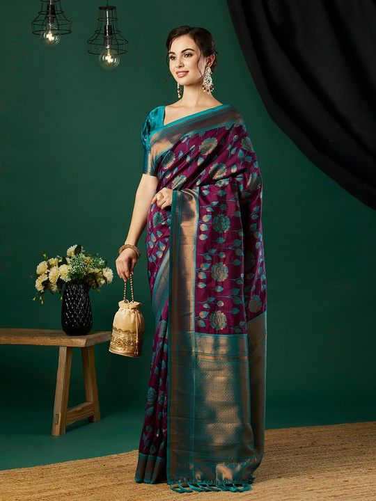 Wine Banarasi Silk Woven Saree With Tassels on Pallu and Stitched Teal Blouse