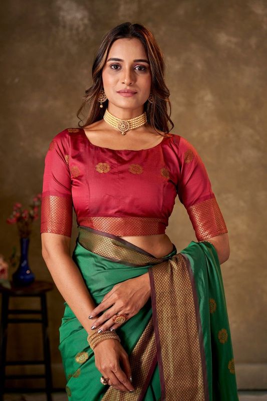 Green Cotton Woven Saree and Stitched Pink Blouse