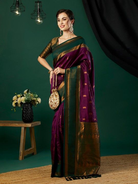 Wine Banarasi Silk Woven Saree With Tassels on Pallu and Stitched Green Blouse
