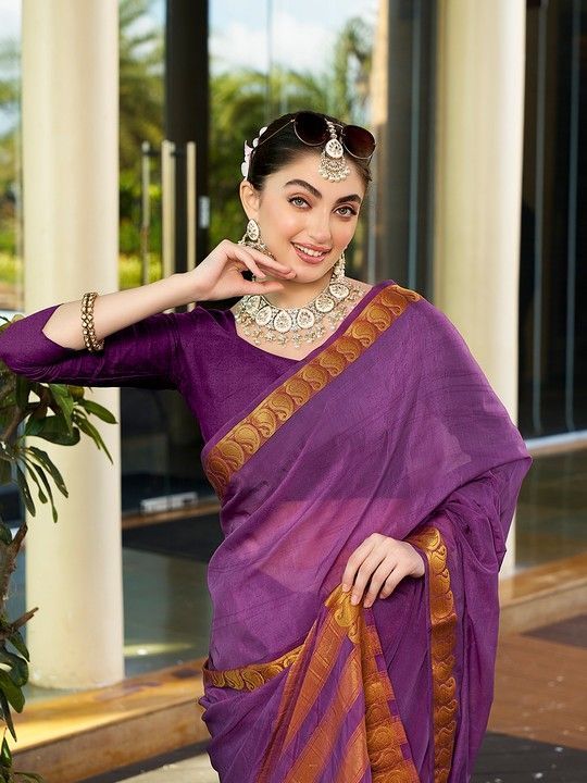 Purple Crepe Woven Saree and Stitched Purple Blouse