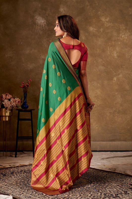 Green Cotton Woven Saree and Stitched Pink Blouse