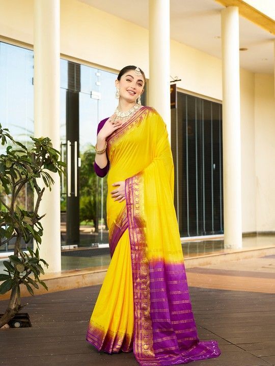 Yellow Crepe Woven Saree and Stitched Wine Blouse