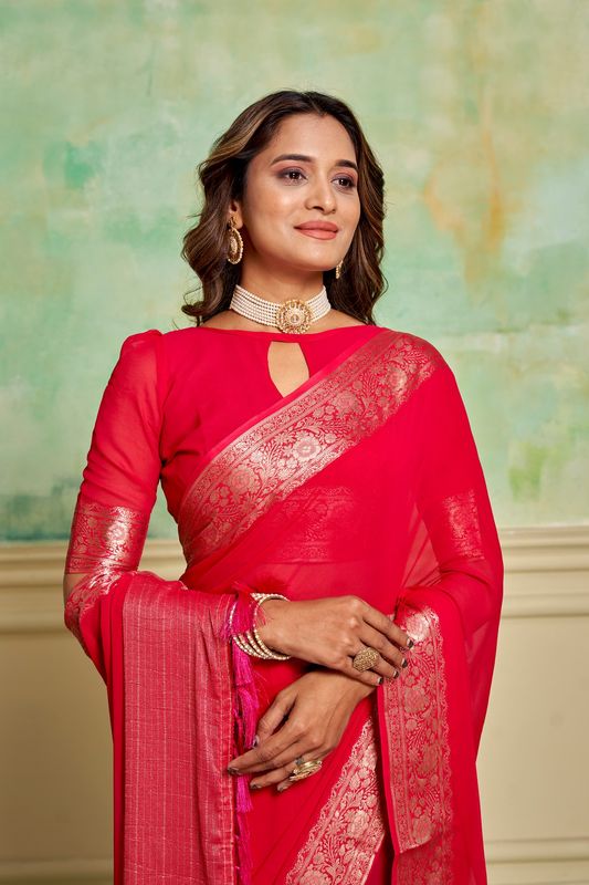 Pink Crepe Woven Saree and Stitched Pink Blouse