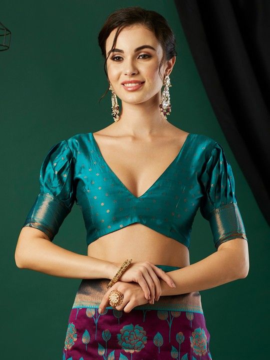 Wine Banarasi Silk Woven Saree With Tassels on Pallu and Stitched Teal Blouse