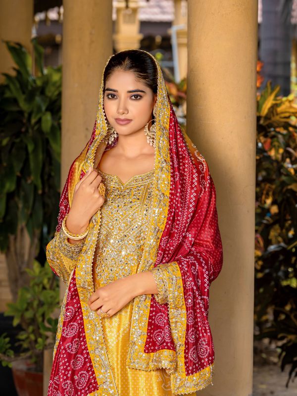Yellow Chinon Bandhani Printed Heavy Salwar Kameez With Jari And Mirror Embroidery Work
