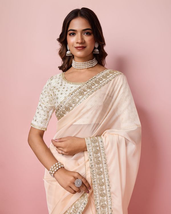 Girlie Peach Color Organza Saree With Ethnic Embroidery Work On Border And Blouse