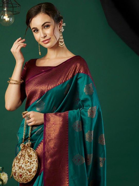 Aqua Banarasi Silk Woven Saree With Tassels on Pallu and Stitched Pink Blouse