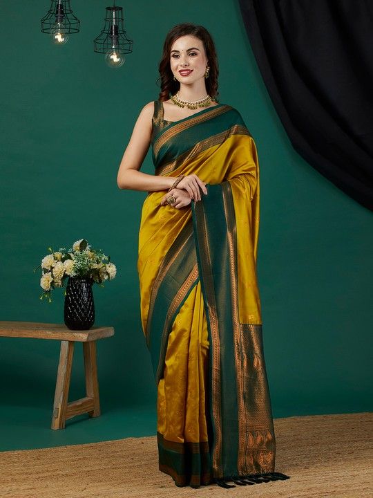 Mustard Banarasi Silk Woven Saree With Tassels on Pallu and Stitched Green Blouse