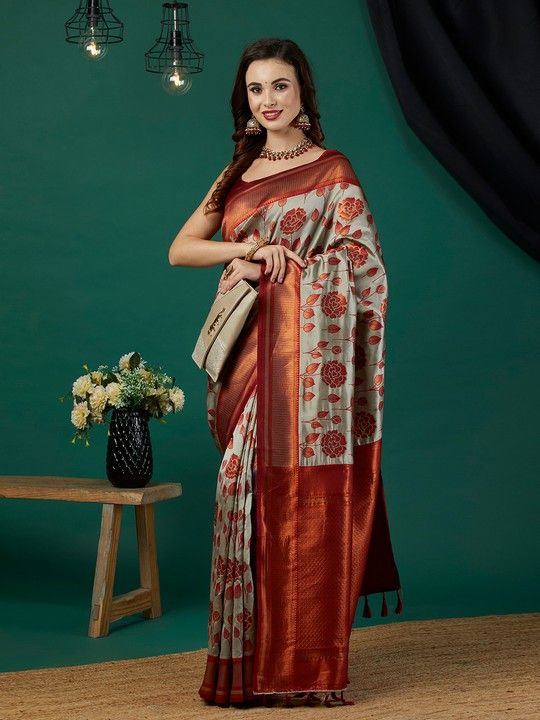 Grey Banarasi Silk Woven Saree With Tassels on Pallu and Stitched Rust Blouse