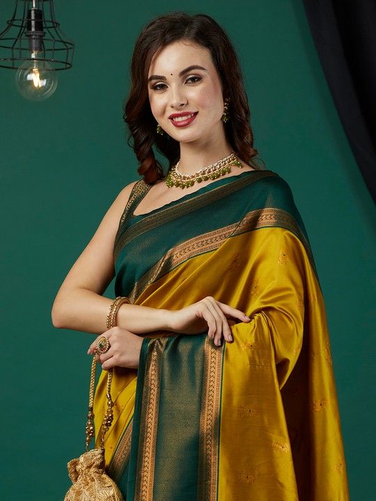 Mustard Banarasi Silk Woven Saree With Tassels on Pallu and Stitched Green Blouse
