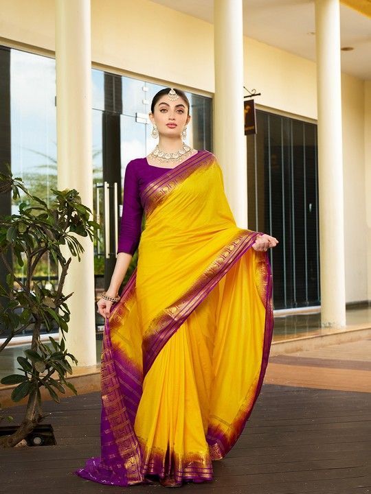 Yellow Crepe Woven Saree and Stitched Wine Blouse