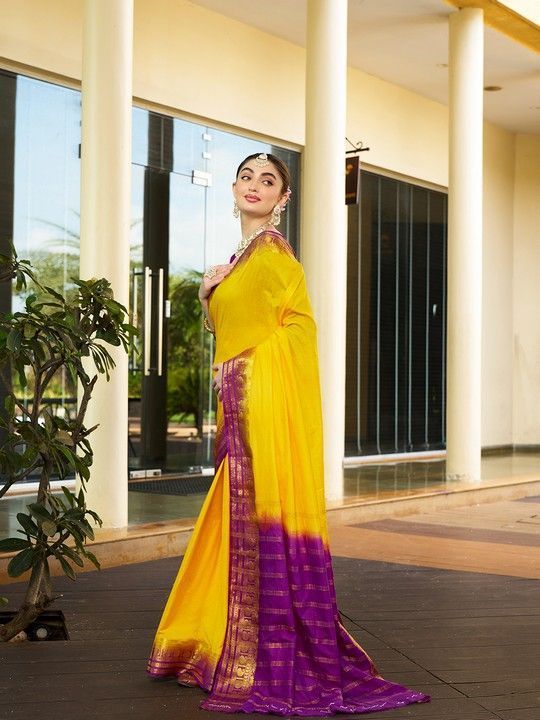 Yellow Crepe Woven Saree and Stitched Wine Blouse