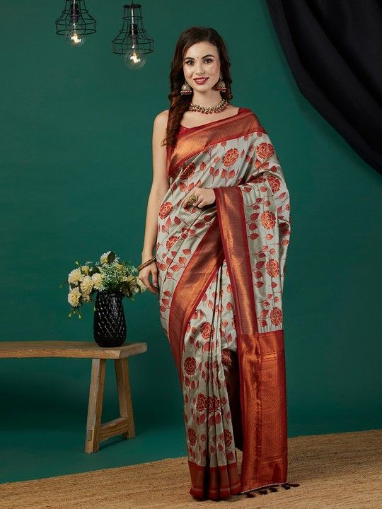 Grey Banarasi Silk Woven Saree With Tassels on Pallu and Stitched Rust Blouse