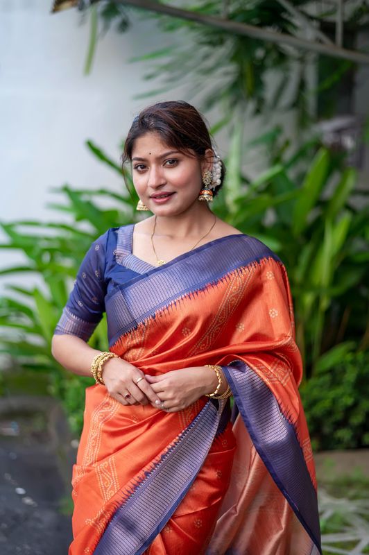Orange Weaving Jari Designer & Printed Raw Silk Saree