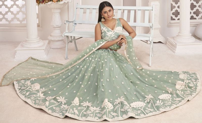 Green embroidered net semi stitched lehenga