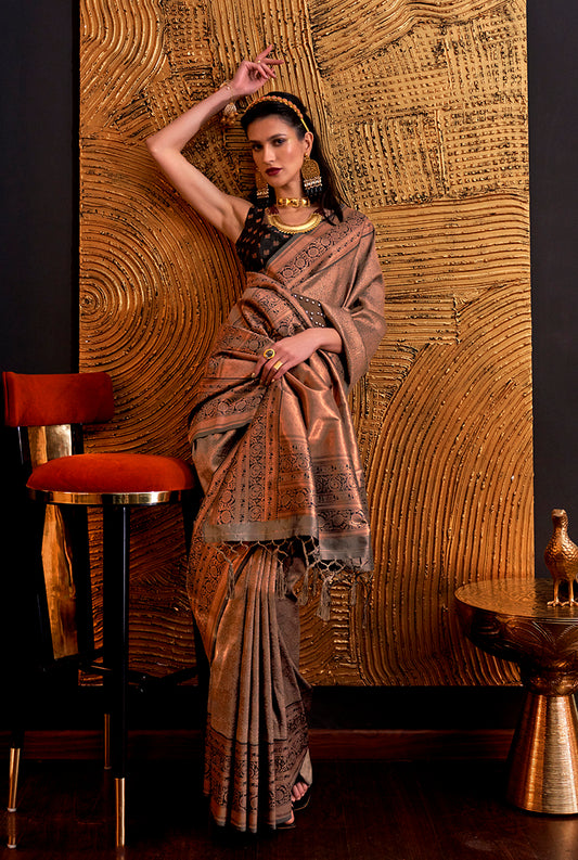 Â Rust woven saree