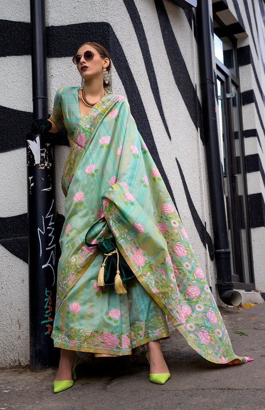 Â Sea green woven saree