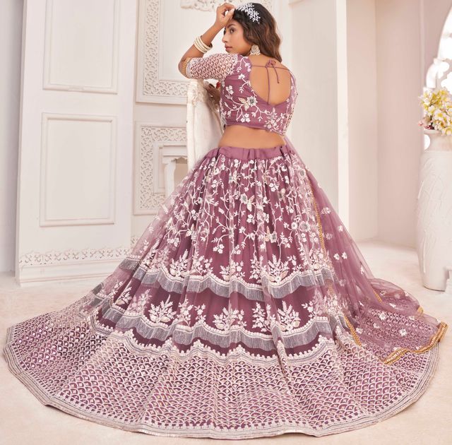 Onion-pink embroidered net semi stitched lehenga