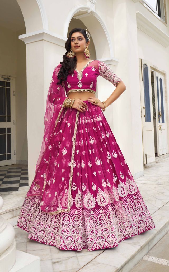 DARK PINK COLOR NET FABRIC LEHENGA CHOLI WITH SEQUINS AND THREAD EMBROIDERY WORK