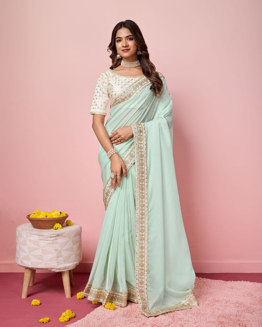 Girlie Sea Green Color Organza Saree With Ethnic Embroidery Work On Border And Blouse