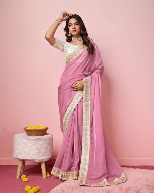 Girlie Pink Color Organza Saree With Ethnic Embroidery Work On Border And Blouse