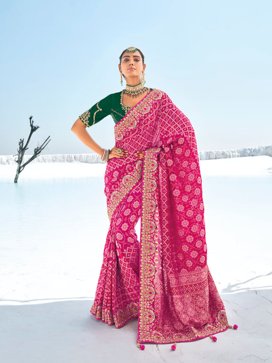 Rani PinkBandhani Patola Printed Saree With Embroidery Work With Two Blouses