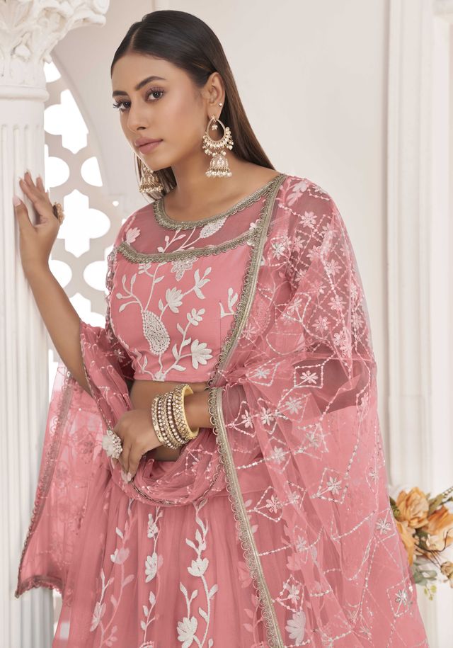 Pink embroidered net semi stitched lehenga