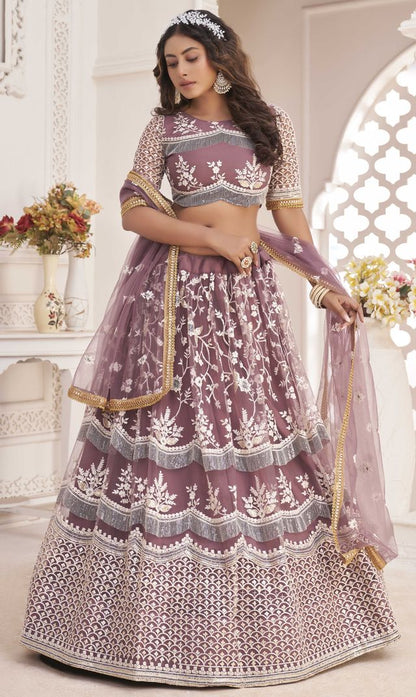 Onion-pink embroidered net semi stitched lehenga