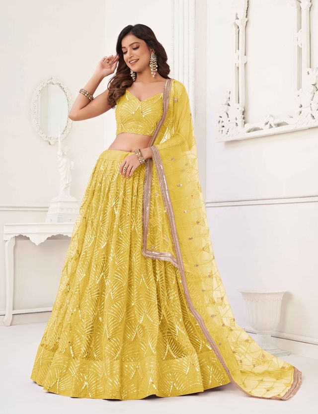 YELLOW COLOR NET FABRIC LEHENGA CHOLI