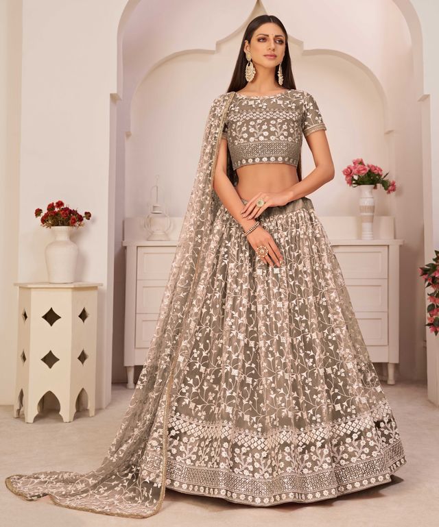 Brown embroidered net semi stitched lehenga