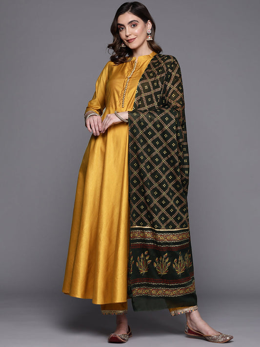 Women Mustard Solid A-Line Kurta Trousers With Dupatta Set