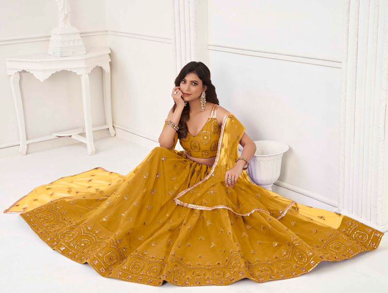 MUSTARD YELLOW COLOR NET FABRIC LEHENGA CHOLI