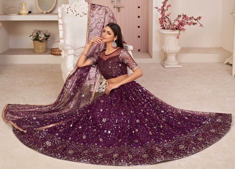 Violet embroidered net semi stitched lehenga