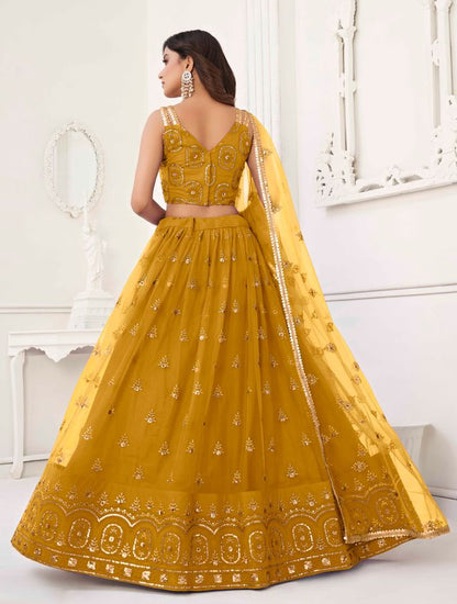 MUSTARD YELLOW COLOR NET FABRIC LEHENGA CHOLI