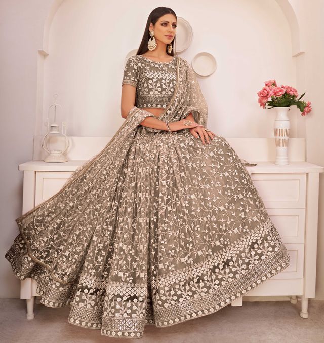 Brown embroidered net semi stitched lehenga