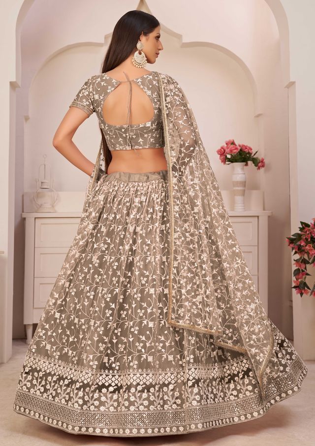 Brown embroidered net semi stitched lehenga