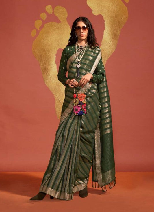 Dark green woven saree