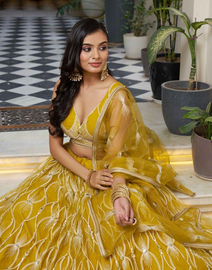 MUSTARD YELLOW COLOR NET FABRIC LAHENGA