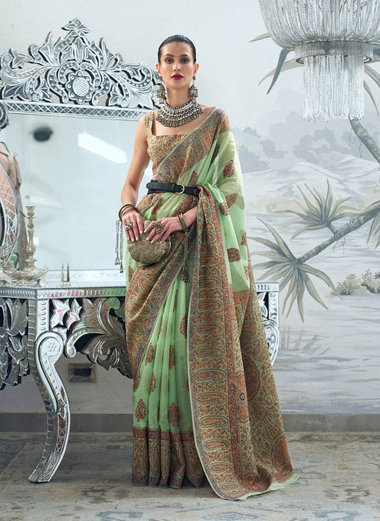  Light green woven saree