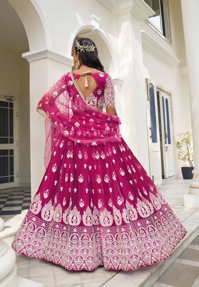 DARK PINK COLOR NET FABRIC LEHENGA CHOLI WITH SEQUINS AND THREAD EMBROIDERY WORK