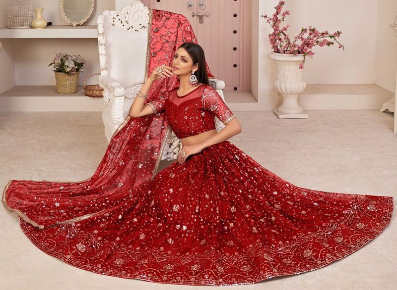 Red embroidered net semi stitched lehenga