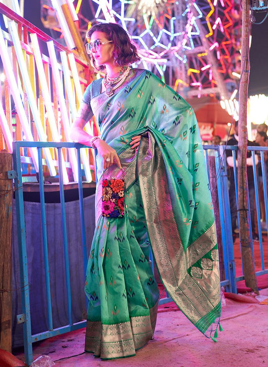 Turquoise woven Saree